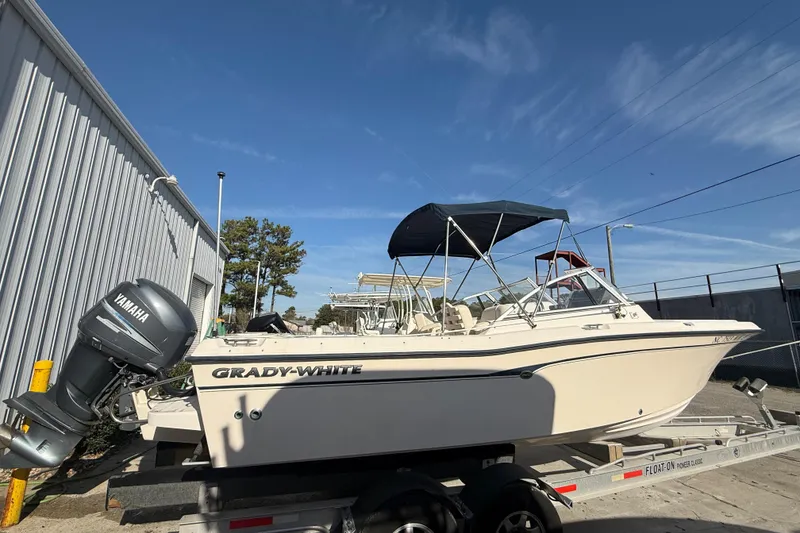 Slide: The Image of 2008 Grady-White Tournament 225 boat with Yamaha engine on trailer. - 2