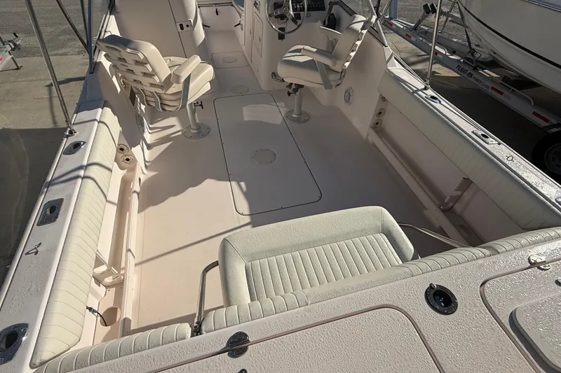 Slide: The Image of 2008 Grady-White Tournament 225 boat interior with seating and steering console. - 4