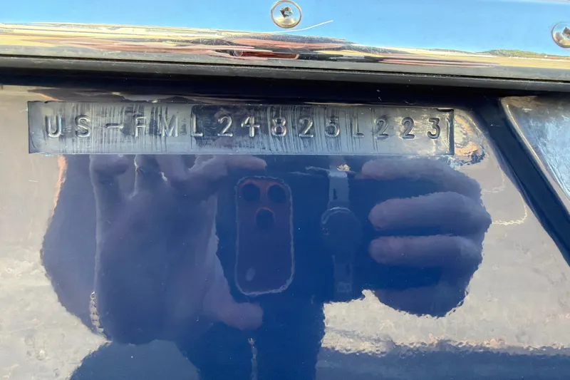 Slide: The Image of 2023 Cutwater C-248 Coupe hull identification number on a reflective surface. - 28