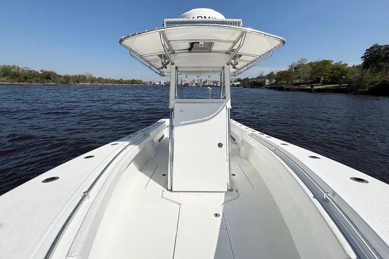 Slide: The Image of 2011 Onslow Bay 27 Offshore boat on calm water, clear sky background. - 18