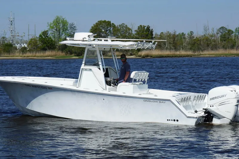 Slide: The Image of 2011 Onslow Bay 27 Offshore boat on water with Mercury engines. - 8