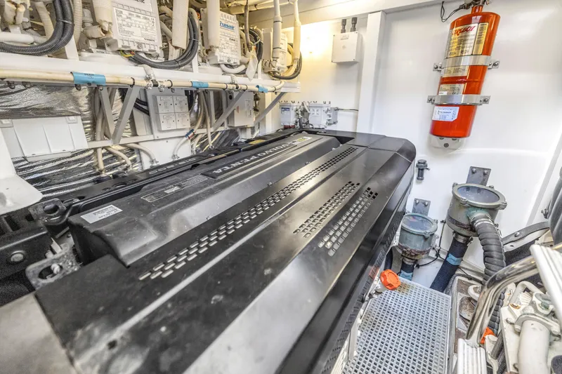 Slide: The Image of Engine room of 2013 Princess V57 yacht with fire extinguisher. - 37