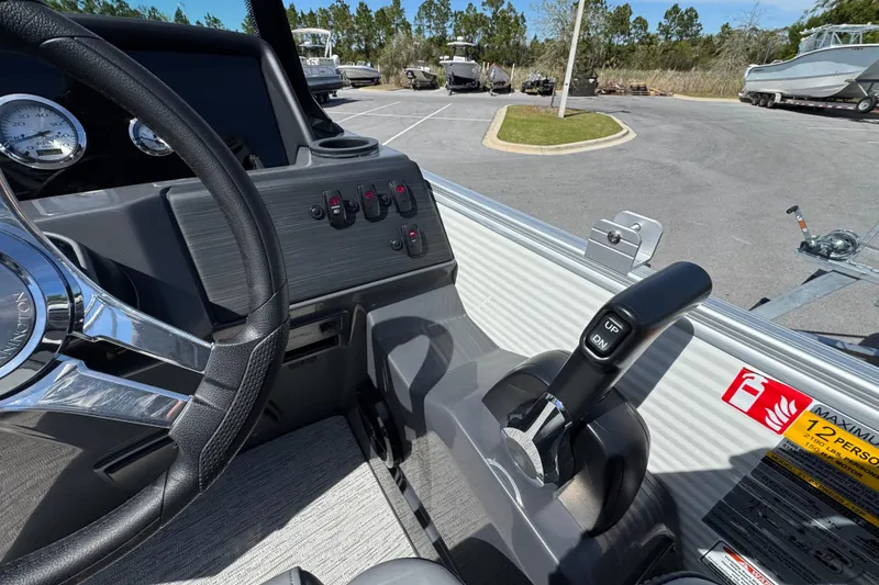 Slide: The Image of Interior view of 2026 Bennington 22 SSR boat dashboard and controls in a parking lot. - 10