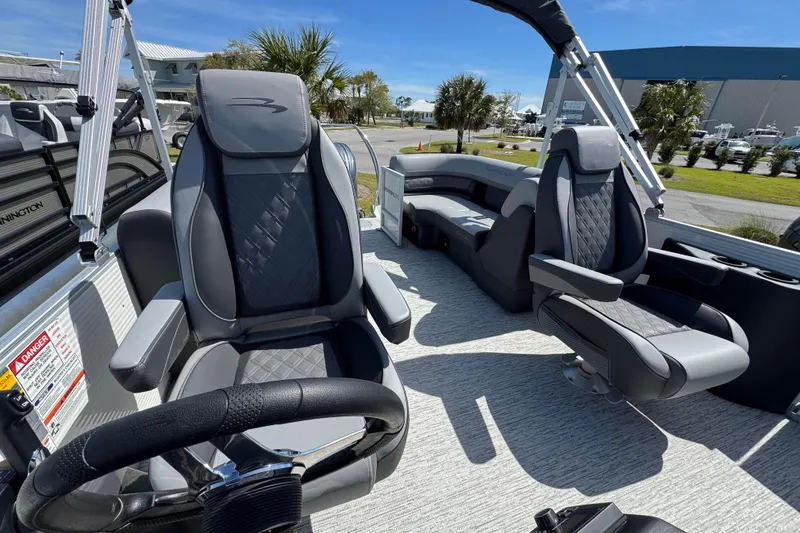 Slide: The Image of 2026 Bennington 22 SSR pontoon boat interior with luxurious seating and modern design. - 11