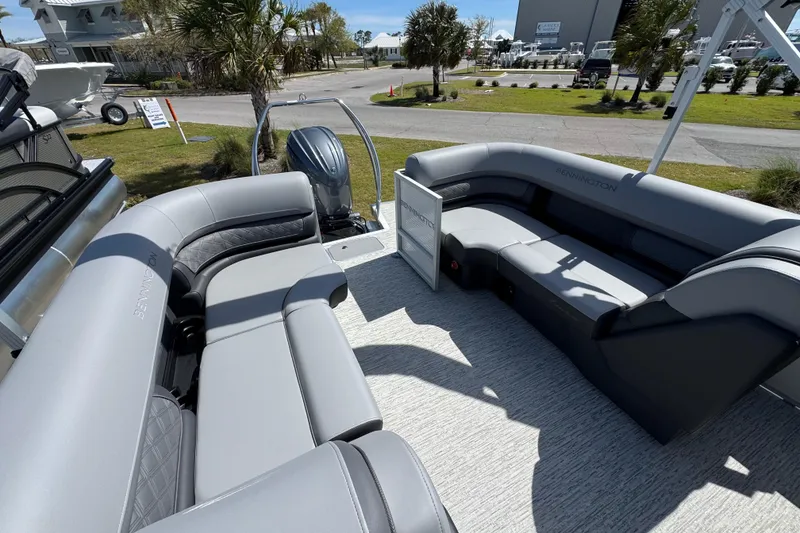 Slide: The Image of 2026 Bennington 22 SSR pontoon boat with luxurious seating and modern design. - 12