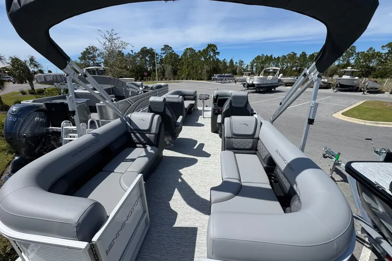 Slide: The Image of 2026 Bennington 22 SSR pontoon boat with spacious seating and modern design. - 15