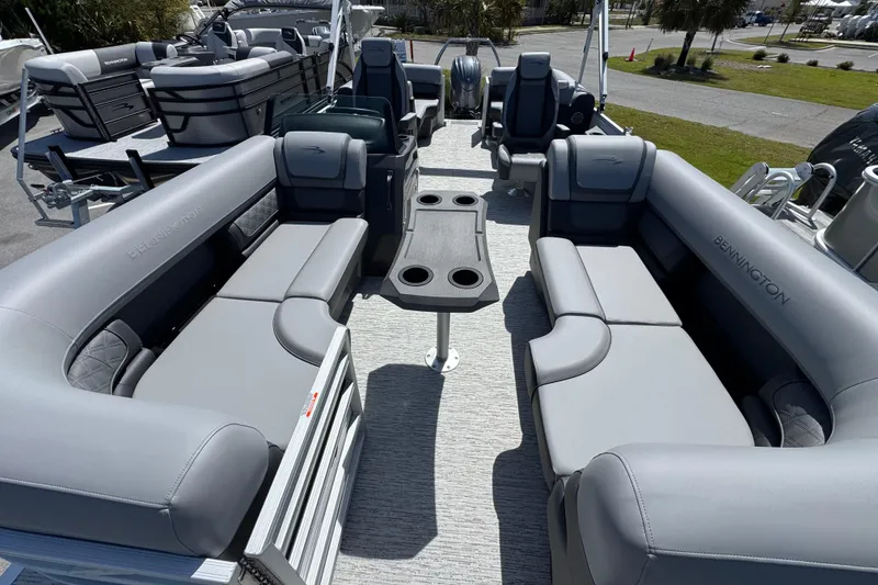 Slide: The Image of 2026 Bennington 22 SSR pontoon boat with spacious seating and modern design. - 7