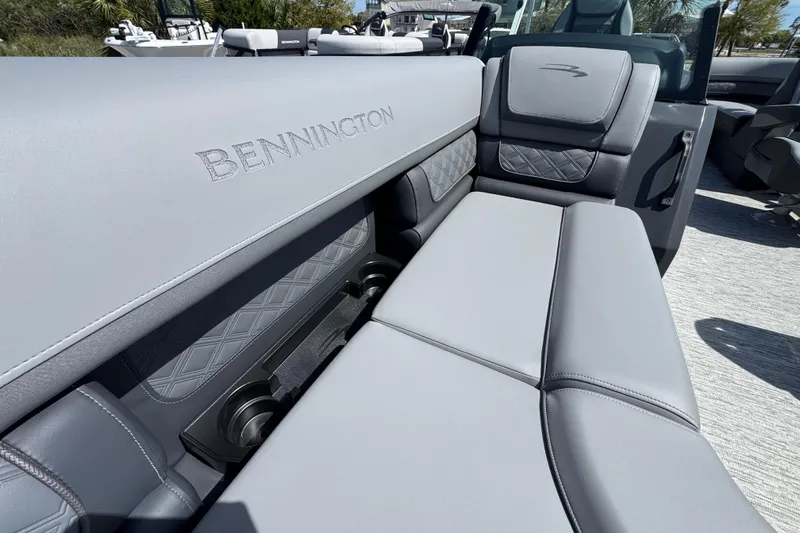 Slide: The Image of Luxurious seating on the 2026 Bennington 22 SSR pontoon boat, featuring elegant gray upholstery. - 8