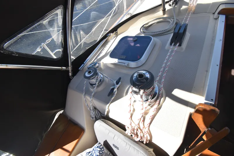 Slide: The Image of Cockpit of 1999 Island Packet 380 sailboat with winches and ropes. - 11