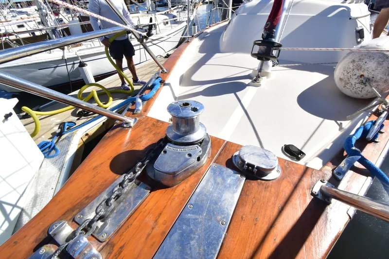 Slide: The Image of Deck of 1999 Island Packet 380 sailboat with winch and anchor chain. - 4