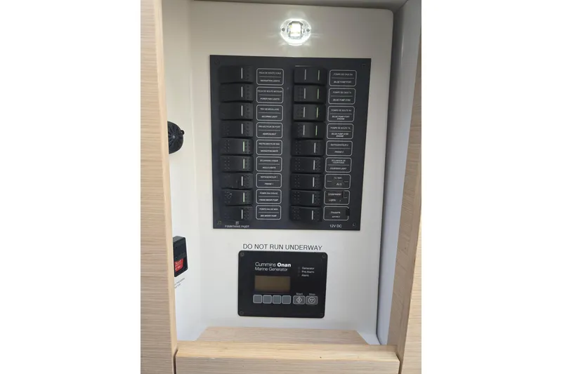 Slide: The Image of Electrical panel of 2018 Fountaine Pajot Helia 44 Evolution catamaran with Cummins generator controls. - 41