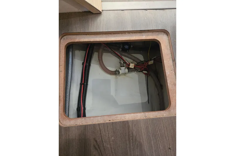 Slide: The Image of Access hatch with wiring inside a 2018 Fountaine Pajot Helia 44 Evolution. - 49