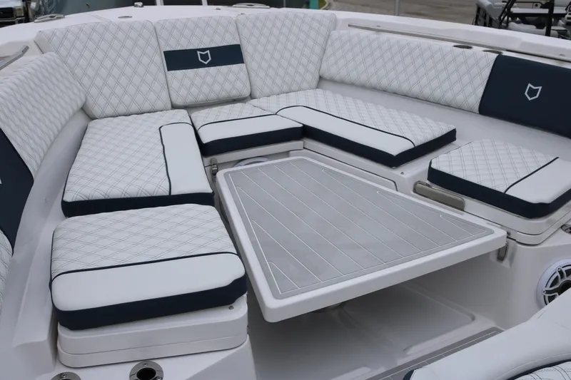 Slide: The Image of Luxurious seating area on 2026 Sea Fox 368 Commander boat with quilted cushions. - 12