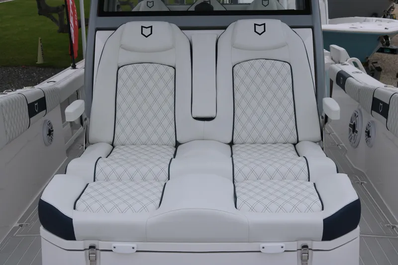 Slide: The Image of Luxurious seating on 2026 Sea Fox 368 Commander boat with diamond-pattern upholstery. - 13