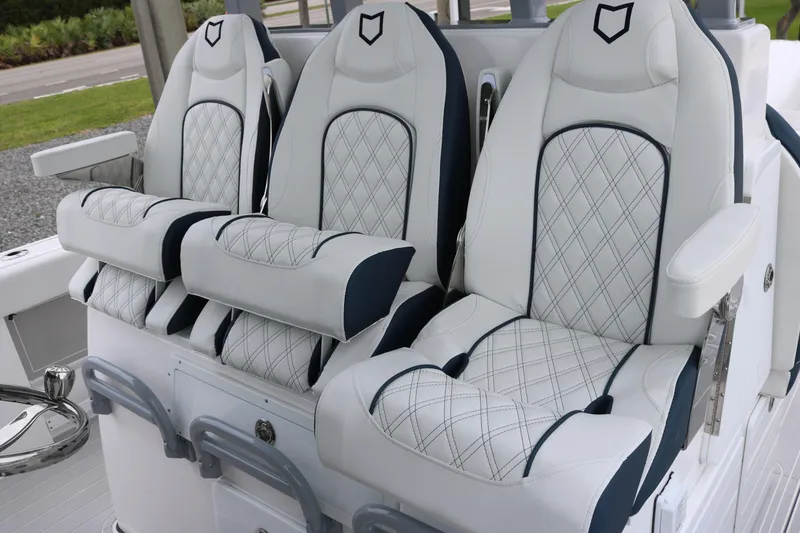 Slide: The Image of Luxurious seating on 2026 Sea Fox 368 Commander boat with diamond-stitched upholstery. - 20