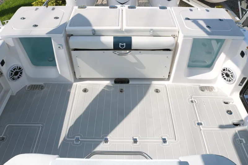 Slide: The Image of Spacious deck of 2026 Sea Fox 368 Commander boat with storage and speakers. - 28