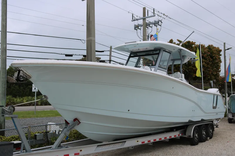 Slide: The Image of 2026 Sea Fox 368 Commander boat on trailer, side view. - 3