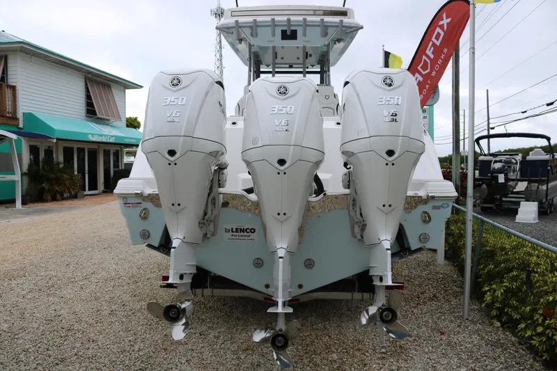 Slide: The Image of 2026 Sea Fox 368 Commander with triple Yamaha 350 V6 outboard engines displayed outdoors. - 6