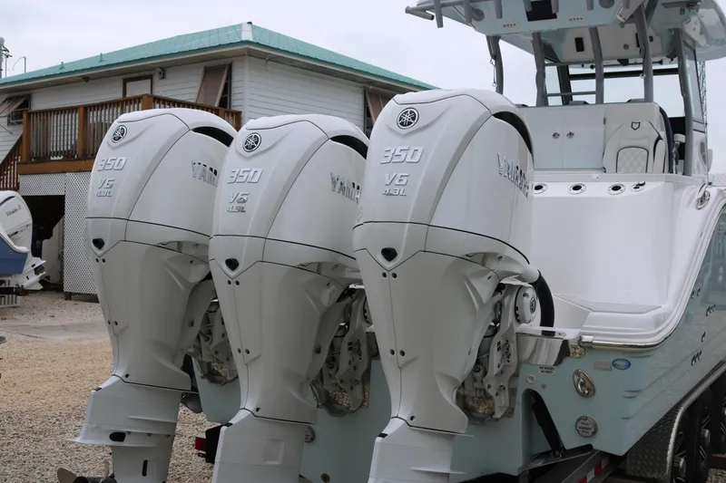 Slide: The Image of 2026 Sea Fox 368 Commander with triple Yamaha 350 V6 outboard engines. - 7