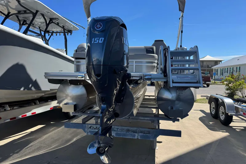 Slide: The Image of 2026 Bennington 22 SSB pontoon boat with Yamaha 150 engine on trailer. - 4