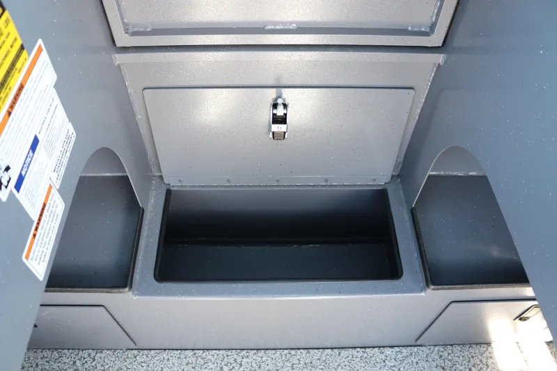 Slide: The Image of Storage compartment of 2026 Alumaweld Stryker 202 boat, featuring secure latch. - 18
