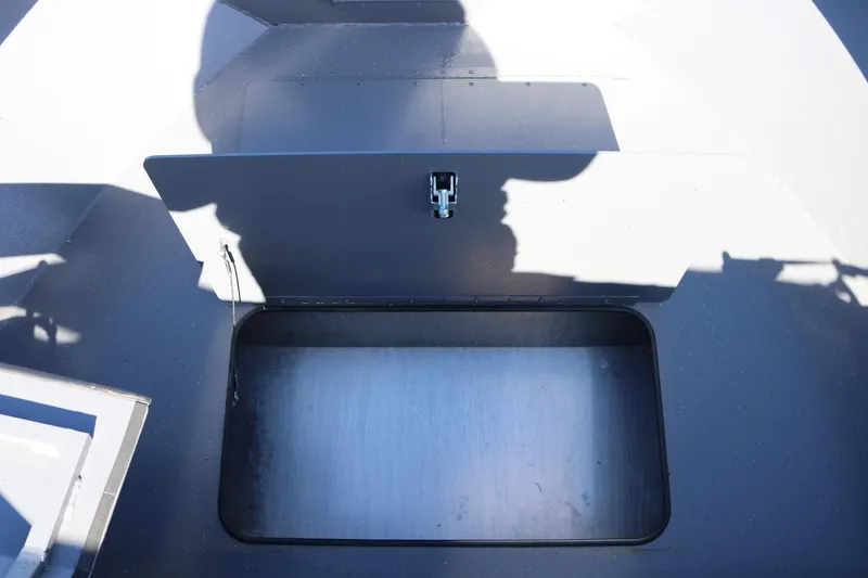 Slide: The Image of 2026 Alumaweld Stryker 202 boat storage compartment, open and empty. - 28