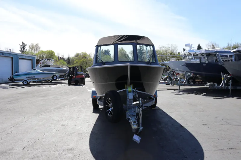 Slide: The Image of 2026 Alumaweld Stryker 202 boat on trailer in outdoor showroom. - 6