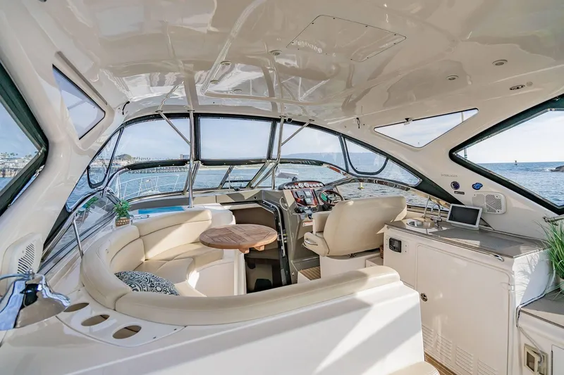 Slide: The Image of Luxurious interior of 2010 Regal Commodore 4460 yacht with elegant seating and ocean view. - 12