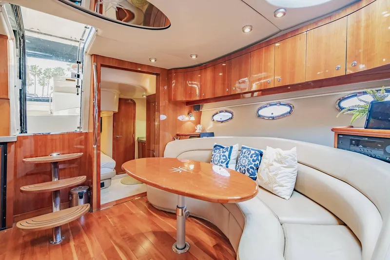 Slide: The Image of Luxurious interior of 2010 Regal Commodore 4460 yacht with elegant wood finishes. - 47