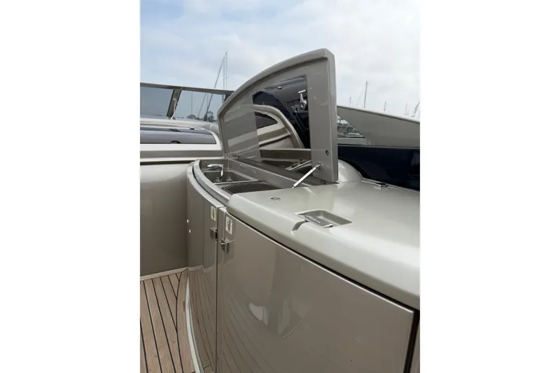 Slide: The Image of 2012 Riva 44' Rivarama yacht with open deck storage compartment. - 17