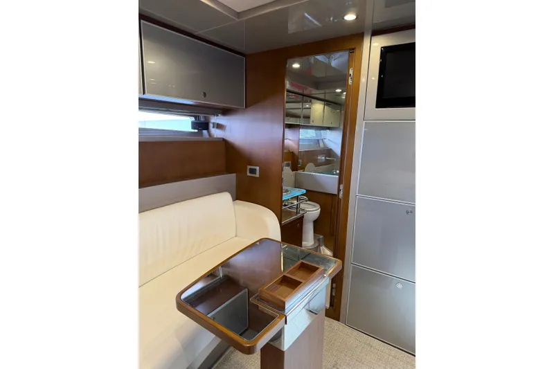 Slide: The Image of Luxurious interior of 2012 Riva 44' Rivarama yacht with elegant seating and modern amenities. - 20