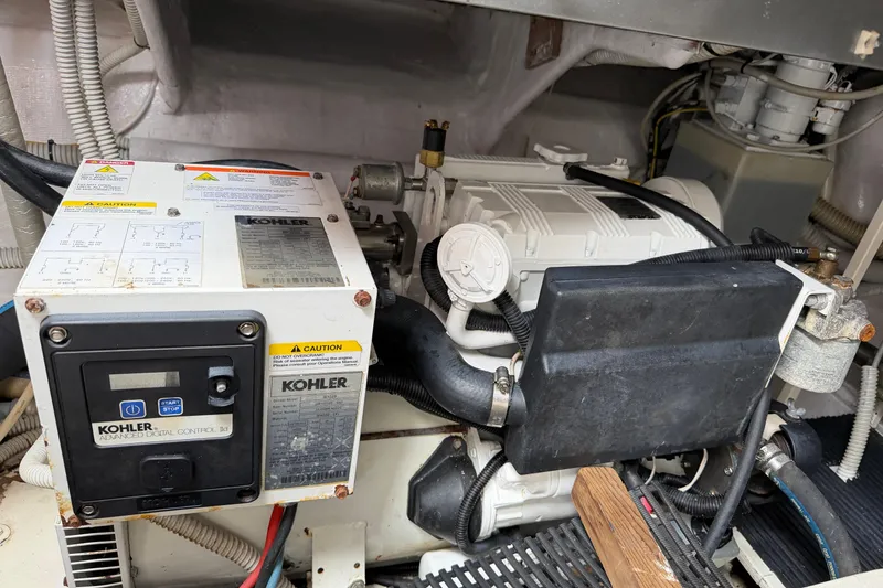 Slide: The Image of Engine compartment of a 2012 Riva 44' Rivarama with Kohler generator. - 23