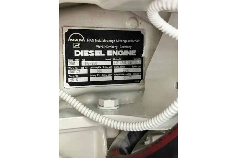 Slide: The Image of Label of a MAN diesel engine in a 2012 Riva 44' Rivarama yacht. - 26