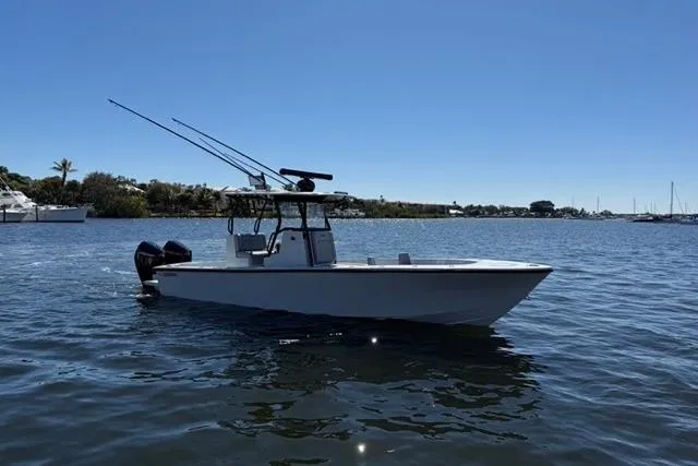Slide: The Image of 2026 Orion 29 boat on calm water with clear blue sky. - 22
