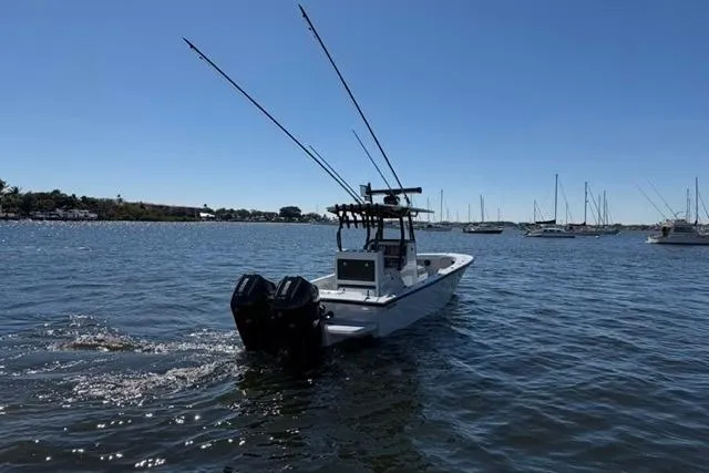 Slide: The Image of Fishing boat Orion 29 (2026) with dual engines on a calm lake. - 23