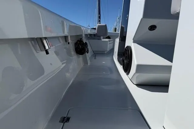 Slide: The Image of Modern Orion 29 boat interior, sleek design, spacious deck, 2026 model. - 25