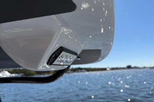 Slide: The Image of Close-up of Orion 29 boat's LED light against a sunny waterfront, 2026 model. - 28
