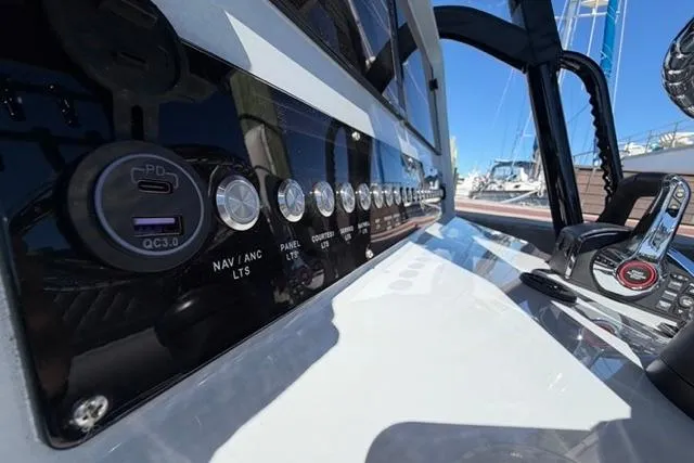Slide: The Image of Control panel of 2026 Orion 29 boat with USB port and switches. - 30