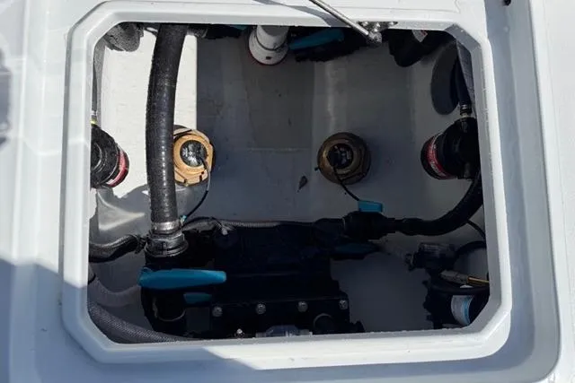 Slide: The Image of Engine compartment of 2026 Orion 29 boat with visible hoses and fittings. - 5