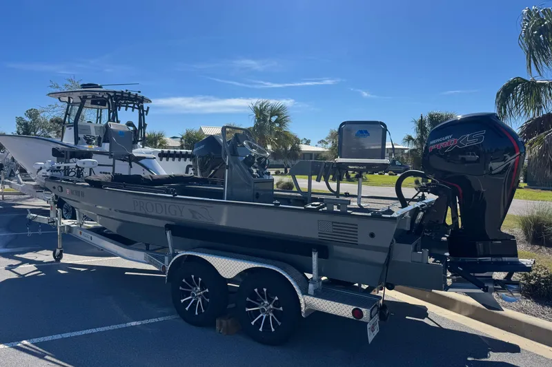 Slide: The Image of 2024 Prodigy 1960 Marsh Tuff boat on trailer with Mercury Pro XS engine. - 4