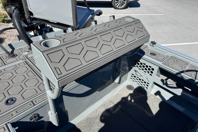 Slide: The Image of Interior of 2024 Prodigy 1960 Marsh Tuff boat with hexagonal patterned flooring. - 8