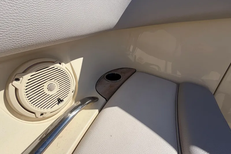 Slide: The Image of 2019 Chris-Craft Launch 30 interior detail with speaker and cup holder. - 12