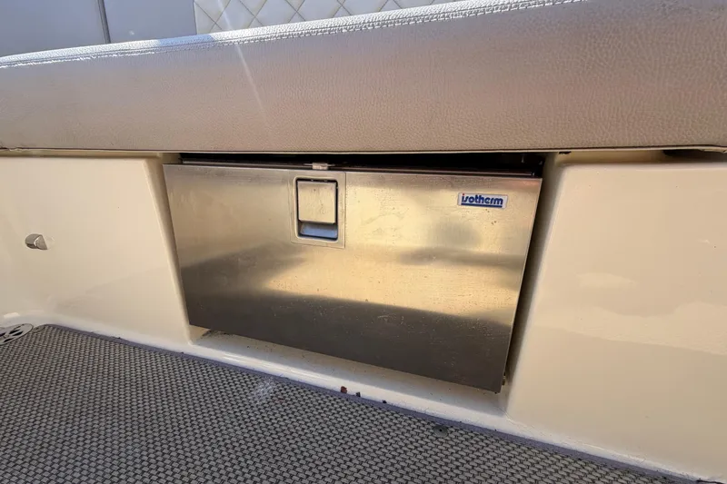 Slide: The Image of Built-in cooler on 2019 Chris-Craft Launch 30 boat, featuring stainless steel finish. - 19