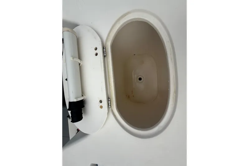 Slide: The Image of Battery and wiring inside a 2005 Sea Hunt Triton 232 boat. - 10
