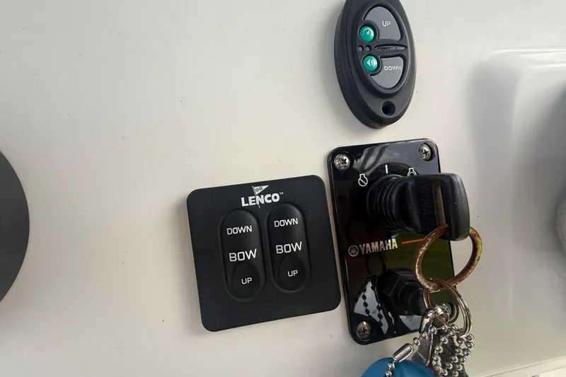 Slide: The Image of Garmin GPS display on 2005 Sea Hunt Triton 232, showing map and water temperature. - 20