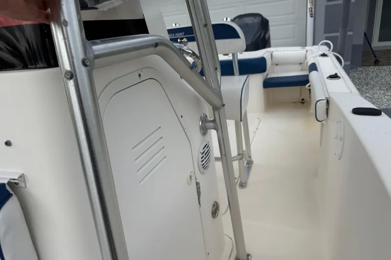 Slide: The Image of Garmin device installed on a 2005 Sea Hunt Triton 232 boat. - 42