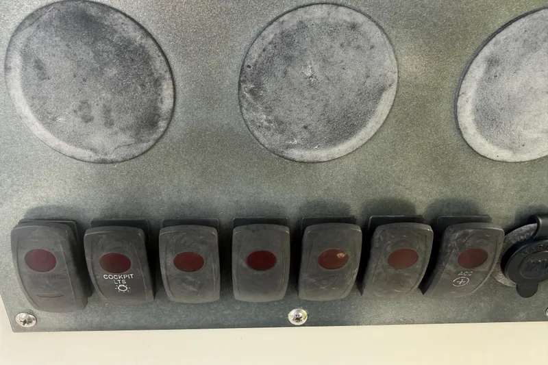 Slide: The Image of 2005 Sea Hunt Triton 232 boat detail with knife holder and speaker. - 52