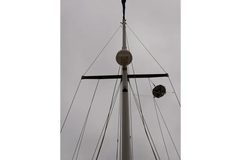 Slide: The Image of Mast of 1996 Catalina 36 MkII sailboat against cloudy sky. - 18