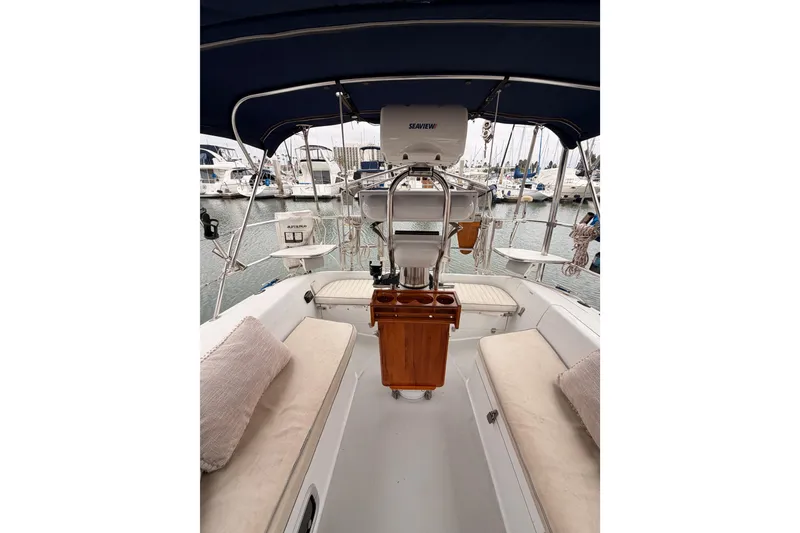 Slide: The Image of Cockpit of 1996 Catalina 36 MkII sailboat with seating and navigation equipment. - 22