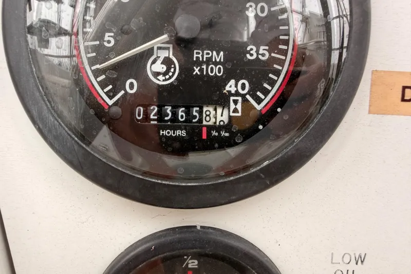 Slide: The Image of RPM gauge of a 1996 Catalina 36 MkII, showing 2365.8 hours. - 27